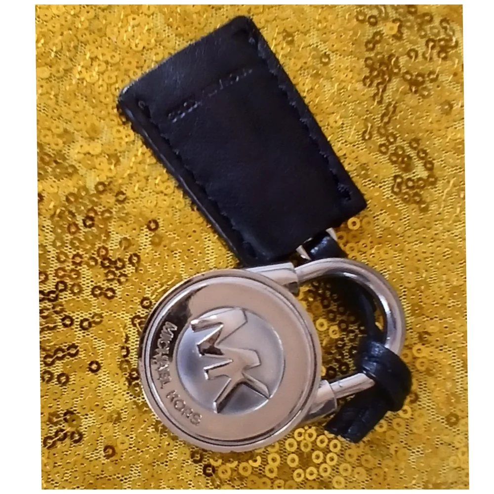 Michael Kors Black and Silver Key Holder And A Clothe Cleaner